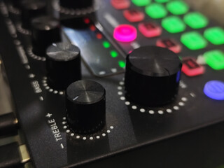 The soundcard is active with multicolored lights, photographed from close range.