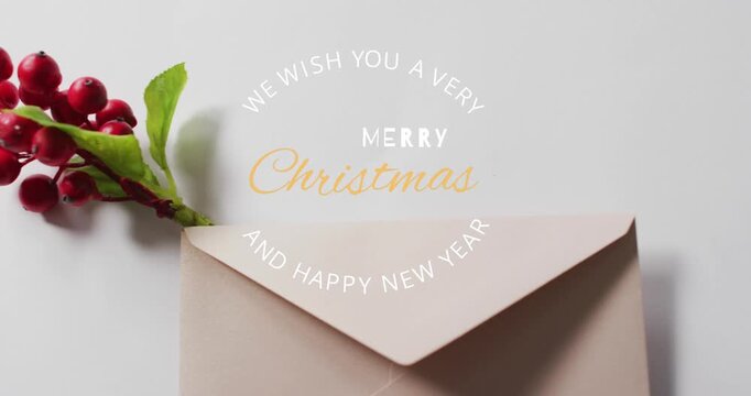 Animation of merry christmas and happy new year text banner over red berries and envelope