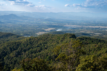 Green mountain landscape under blue sky with scenic viewpoint symbolizing freedom, travel, relaxation and deep connection with nature, 4k video footage