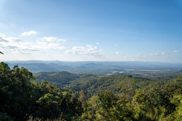 Green mountain landscape under blue sky with scenic viewpoint symbolizing freedom, travel, relaxation and deep connection with nature, 4k video footage