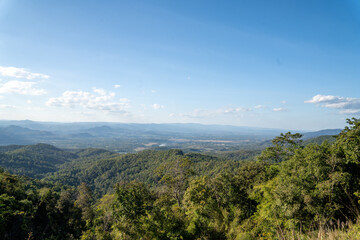 Green mountain landscape under blue sky with scenic viewpoint symbolizing freedom, travel, relaxation and deep connection with nature, 4k video footage