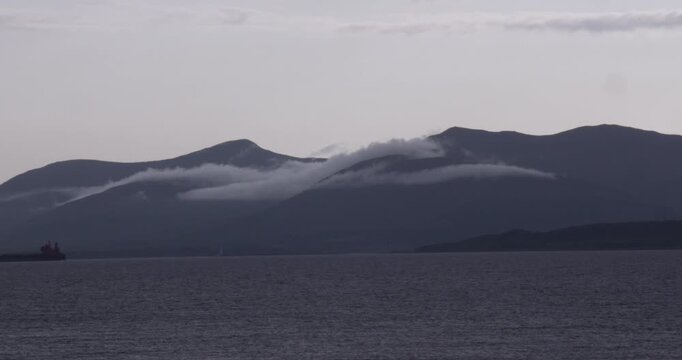 artistic aesthetics shot of the Isle of Mull with clouds at duck in the Scottish Highlands