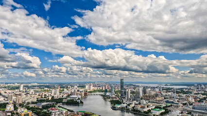 A panorama of a large developing city with diverse architecture.