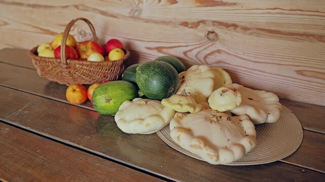 Rustic still life, autumn harvest - patissons, zucchini, pumpkin, apples, pears