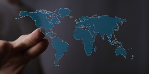 Hand touching digital world map. Global business, technology, connection concept.