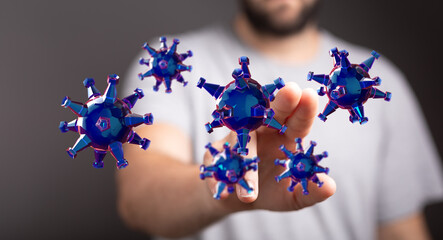 Conceptual image of a man interacting with floating virus models, representing medical advances and disease aw