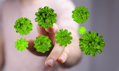 Hand touching abstract green virus cells. Concept of medical research and pandemic threat. Prevention and prot