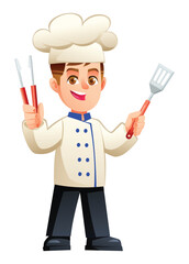 Happy boy chef character standing and holding metal tongs and a spatula. Vector cartoon illustration
