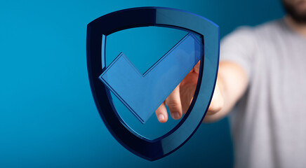 Concept of insurance, business, security and safety represented by a shield symbol with a...