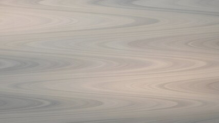 Obraz premium Abstract Pale Beige Background with Soft Wavy Lines and Subtle Texture Minimalist Light and Shadow Composition Elegant Neutral Design for Backdrop