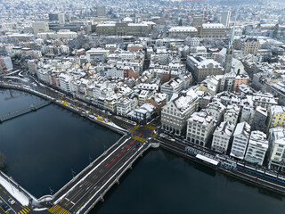Aerial view of Swiss city of Z&uuml;rich on a snowy winter day with snow covered rooftops. Photo taken January 11th, 2026, Zurich, Switzerland.