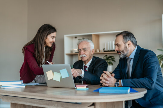 Multi-Generational Business Team Smiling Together in Modern Office &ndash; Family Business Atmosphere
