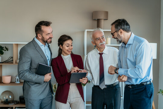 Multi-Generational Business Team Working Together in Modern Office &ndash; Mixed Generations
