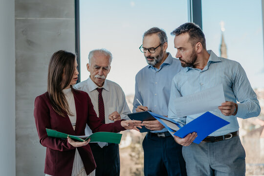 Multi-Generational Business Team Working Together in Modern Office &ndash; Mixed Generations