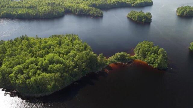 Lake landscape with many small islands in Northern Europe
