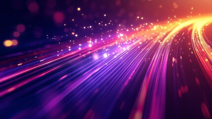 A vibrant abstract image of colorful light streaks and particles moving rapidly through a dark space