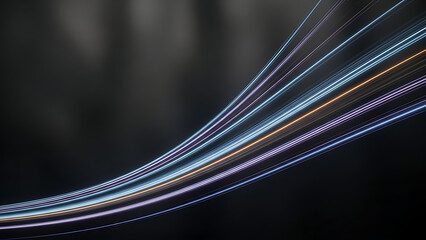 Vibrant multicolored light trails streak across dark background with radiant beams