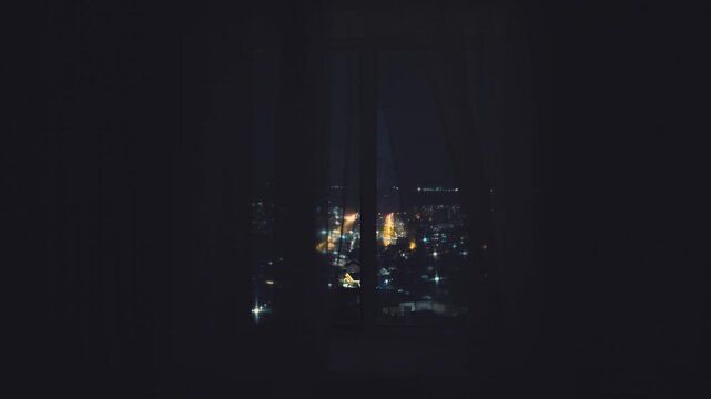 without people, empty dark room , white chiffon tulle fly, silk curtain fluttering waving from wind blow ventilation draft. Night twilight early morning dusk blue light black night city lights view