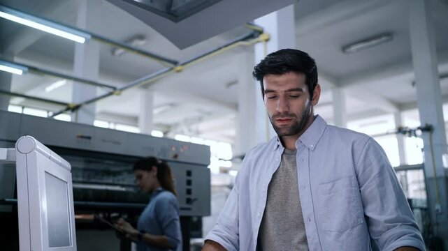 Workers continue to operate under stressful working conditions at the printing plant.