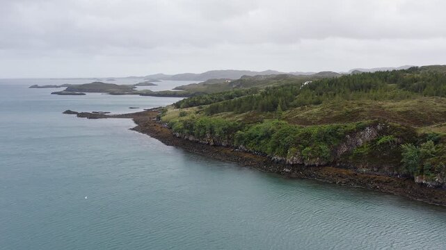 Drone shot of a forest by the coast near Tarbert on the Isle of Harris.