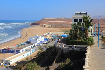 Sidi Ifni seaside town in Morocco. Townscape with sandy beach.