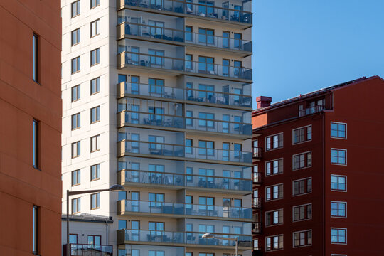 Modern architecture apartment building skyline with highrise in urban Liljeholmskajen Stockholm presenting residential real estate growth