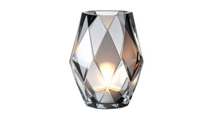 Ornate glass votive with faceted design, illuminated from within