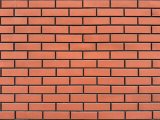 Red brick wall background texture pattern for architectural design. Construction material surface concept for building and renovation banner.