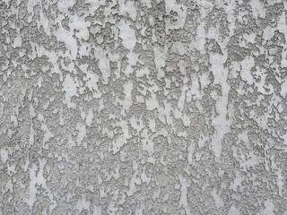 Gray concrete wall texture background. Rough plaster surface material for architecture and construction. Abstract building facade.