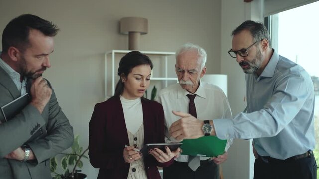Multi-Generational Business Team Working Together in Modern Office &ndash; Mixed Generations