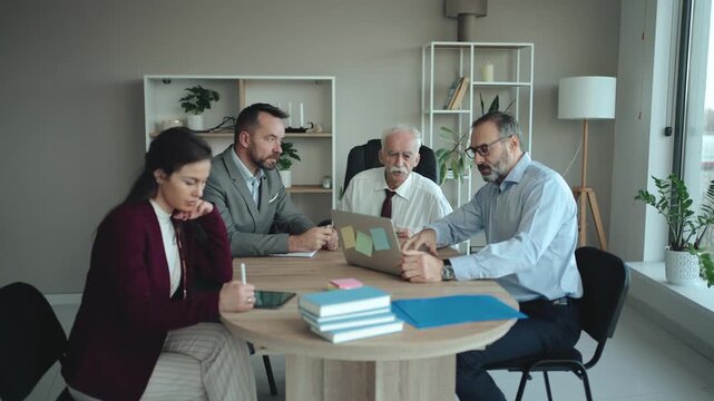 Multi-Generational Business Team Working Together in Modern Office &ndash; Mixed Generations