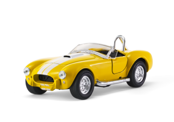 Miniature yellow toy racing car on white background