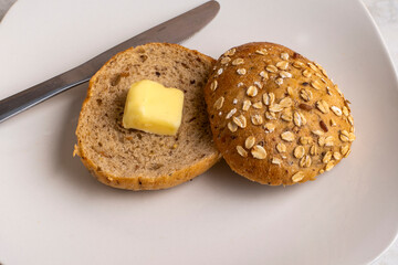 multi grain bagel  with a slice of butter