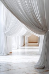 Naklejka premium White draped fabric arches form a dreamy corridor, resembling an elegant wedding venue. Concept Dreamy wedding decor, White fabric arches, Elegant ceremony backdrop, Romantic aisle setup