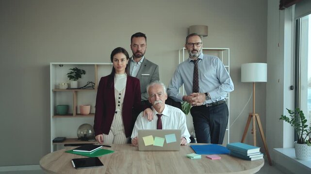 Multi-Generational Family Business Team Portrait in Modern Office &ndash; Serious Expression Family Firm