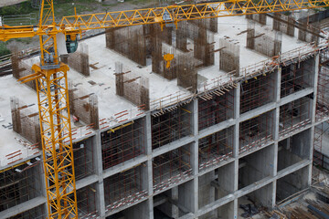 Construction site with Building Tower Crane. Construction of an apartment building