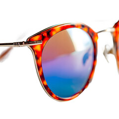 Stylish tortoise sunglasses with dark tinted lenses and sleek modern design suitable for fashion
