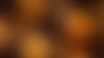 Blurred orange and brown background with gradient effect and soft focus