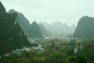 Cao bang, Vietnam - December 24,2025 : a rural village nestled among the striking limestone karst mountains in the northern Vietnam