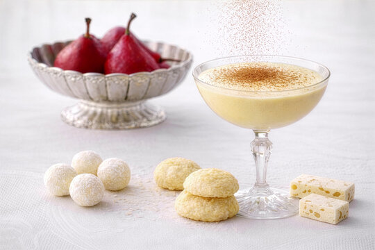 Porchierte Birnen in Rotwein mit Prosecco Zabaione 