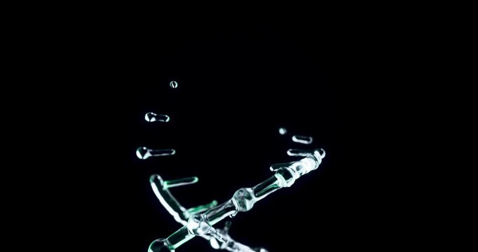 Luminous Cyan Glass DNA Helix Forming and Rotating on Black Background for Genetics and Scientific Presentations.