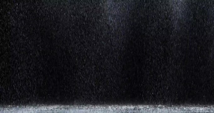 heavy rain looping over black background. Isolated Rain Loop on Black and green screen