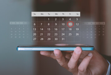 Schedule planning, reminders, time management, mobile productivity, and smart personal organization . Person using smartphone with digital calendar overlay, highlighting an important date.