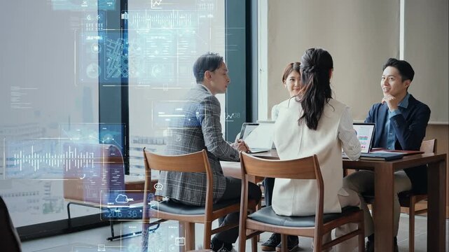 会議するビジネスパーソンのグループとデジタルテクノロジーのコンセプト