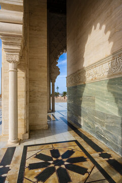 Ornate architectural details and shadows of a historic building with blue sky in the background. Rabat, Morocco