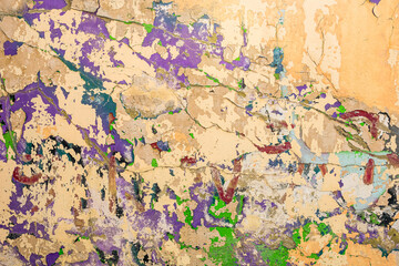Abstract multicolor grunge background with abstract color texture. Abstraction from collapsing graffiti on the wall. Weathered wall background.