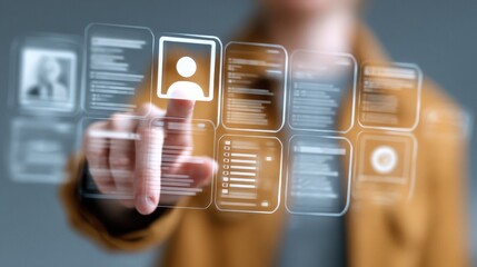 Person interacts with digital touchscreen displaying user interface elements and information at modern workspace in a technology-focused environment