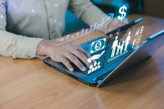 Businessman using laptop with employee benefits icons. Concept of salary compensation, family insurance coverage, social security welfare, and human resources management for corporate workforce.