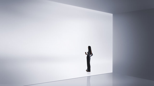 Graphic mixed media with woman standing before glowing wall. Concept of digital showrooms, immersive brand spaces, product demonstrations, technology marketing and corporate environments.