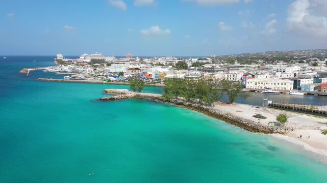 4K Aerial drone view of Barbados island with turquoise water and rocky bay